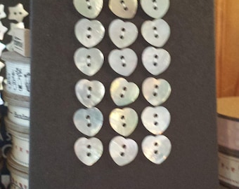Set of mother of pearl heart shape buttons