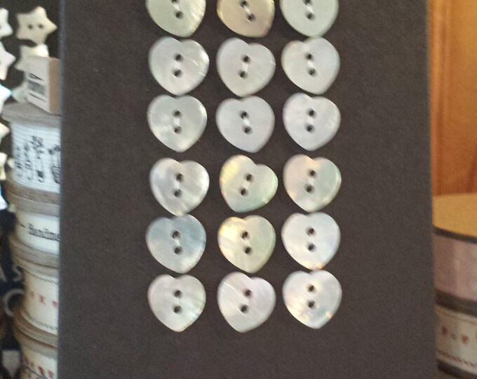 Set of mother of pearl heart shape buttons