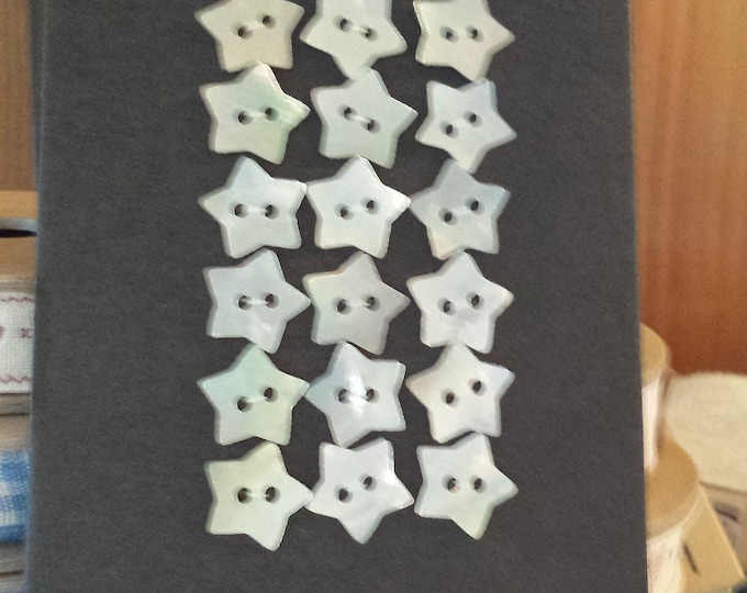 Set of mother of pearl heart shape buttons