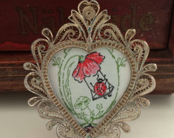 Silver picture frame, heart shaped filligree