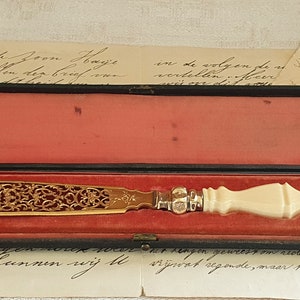Brieföffner, Pagewender, Ende des 19ten Jahrhunderts französisch, Versilberung