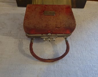 Antique sewing purse with antique bone sewing tools, red velvet, French