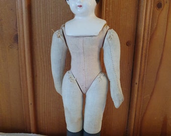 antique doll with cerfamic or china head