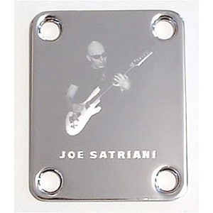May include: Chrome guitar plate with a black and white photo of Joe Satriani playing a guitar. The plate has four screw holes.