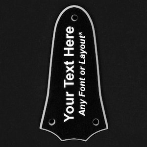 Könnte beinhalten: Schwarze Gitarrenkopfplatte mit weißem Text, der "Your Text Here" und "Any Font or Layout*" lautet
