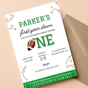 May include: A white invitation with green and brown accents for a first birthday. The text reads "Parker's first year down" with a football graphic and the number "ONE". Includes date, time, and RSVP information.