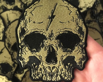 Embroidered Gold Lightning Skull Patch