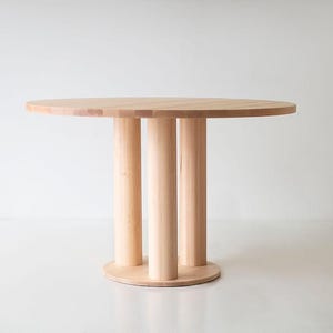 Cava Modern Round Dining Table in Maple