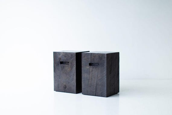 Modern wood side table with cutouts, great for a stool