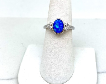 Sterling Silver Oval Blue Opal Solitaire Ring with Cubic Zirconia
