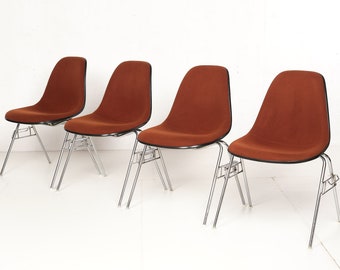 Herman Miller chair, stackable, fiberglass shell, upholstered, set of 4. A total of 9 pieces available