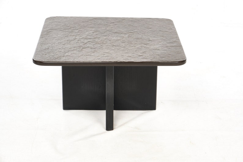 Two slate coffee tables with a black ash frame. image 4