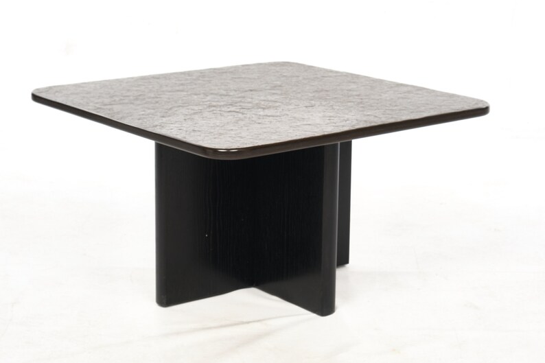 Two slate coffee tables with a black ash frame. image 9