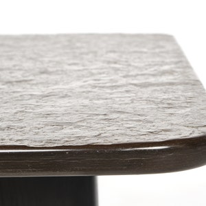 Two slate coffee tables with a black ash frame. image 7