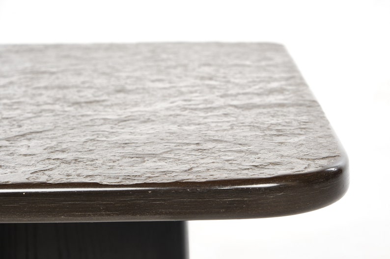 Two slate coffee tables with a black ash frame. image 7