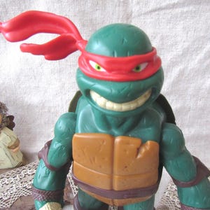 Żółw Ninja, Raphael Ninja, duża kolekcjonerska figurka akcji Wojownicze Żółwie Ninja Raphael Viacom 2012 10 cali