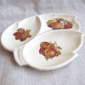 May include: A rustic wooden sign with the text "Welcome to our home" in white lettering. The sign features a distressed finish and a simple, inviting design, perfect for a front porch or entryway.