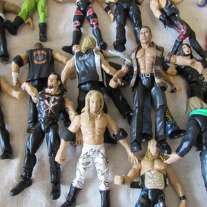Mattel Figuras de acción de la WWE, figura de Cody Rhodes Elite de la WWE  con accesorios, coleccionable