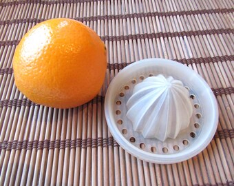 Vintage plastic citruspers, handmatige citroenruimer met zeef