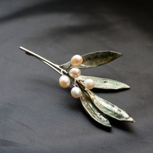 Eco friendly brooch olives