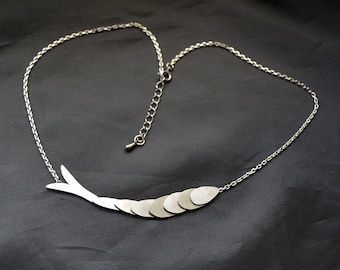 Stainless steel kinetic necklace Fish