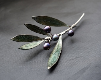 Eco friendly brooch olives