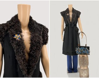 A set of wool vest with fur collar , velvet belt, blue pants, brooch and beautiful purse