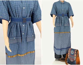 A set of maxi shirt dress with belt, pants, and suede bag
