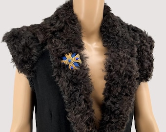 A set of wool vest with fur collar , velvet belt, blue pants, brooch and beautiful purse