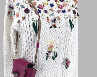 A set of white skirt, cotton floral sweater and  beautiful purse