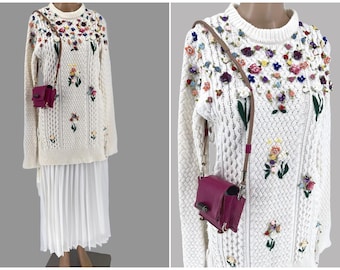 A set of white skirt, cotton floral sweater and  beautiful purse