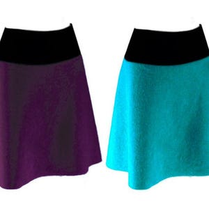 May include: Two A-line skirts with wide black waistbands. One skirt is a deep purple colour, and the other skirt is a vibrant turquoise colour. Both skirts feature a flared silhouette that extends from the solid black waistband to the hemline.