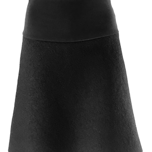 May include: A black, A-line skirt with a wide waistband. The skirt is made of a soft, textured fabric.