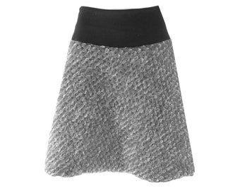 Chic, valuable hip skirt a form soft, knittted wool, happy, warm, Durable, dirt-repellent  The cut adapts wonderfully to the Body shape