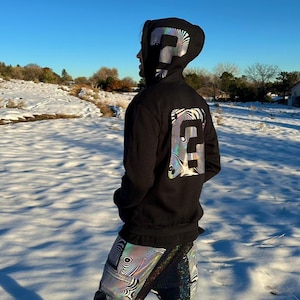 Tipper Questionmark Zip Up Hoodie | Black Holographic Festival Rave Streetwear