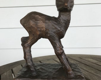 Carved wooden deer or fawn