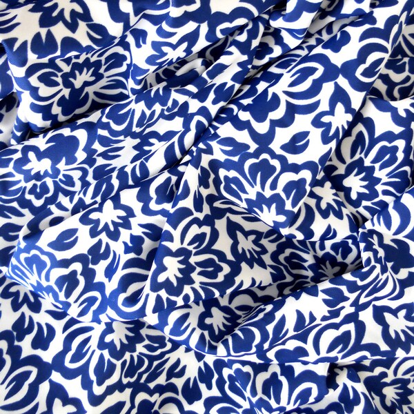 Nylon Spandex tricot. French country monotone print. Indigo blue and white.