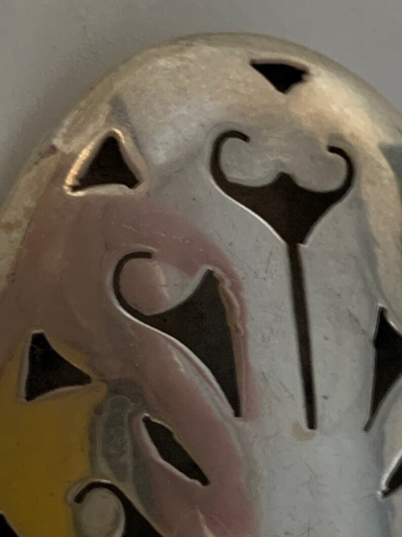 Sterling silver ornate brooch from Mexico.