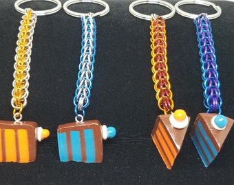 Portal Key Chain with Cake Charm