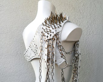 Dream Warriors white leather epaulet, studded armor shoulder pad. Spiked, studded, distressed, straps. Post apocalyptic cosplay costume