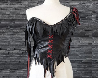 Dream Warriors black leather bustier/one shoulder crop top. Studded, long, fringe fringed. Sexy viking warrior woman style fantasy costume