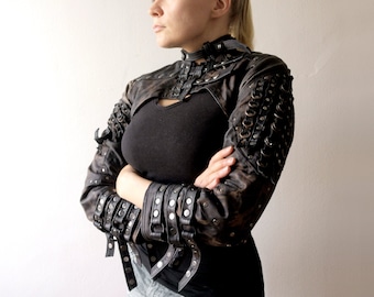 Dream Warriors black leather crop jacket/open back shrug /overbust bolero. Studded, distressed, worn out. Post apocalyptic wasteland fashion