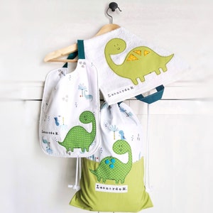 Personalized nursery set with dinosaurs, personalized nursery bag, bib with elastic, personalized towel