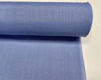 May include: A roll of light blue fabric with a textured weave.