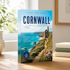 May include: A travel guidebook titled Cornwall: England's Coastal Gem. The cover features a photograph of a coastal cliff path, a stone engine house, and blue ocean water. Text includes Discover, Explore, Experience, and Your Ultimate Travel Guide.