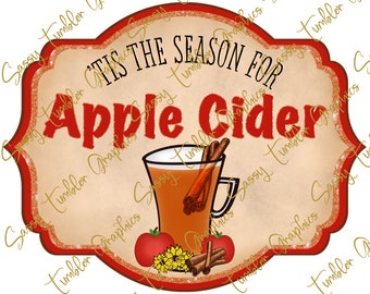 May include: A digital graphic with the text "'Tis the Season for Apple Cider" in red and black. The image features a glass of cider with cinnamon sticks, apples, and sunflowers, all set against a cream-colored background with a red border.