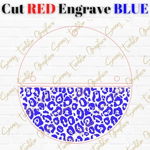 May include: A white circle with a blue leopard print design inside. The circle is divided in half with a red line. The text "Cut RED Engrave BLUE" is at the top of the image.