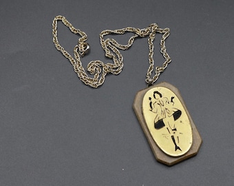 Vintage c 1950s wood and metal pendant necklace novelty illustration figure