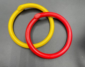 Vintage antique c 1930s art deco pair of red and yellow ketchup and mustard upper arm galalith bangle bangles