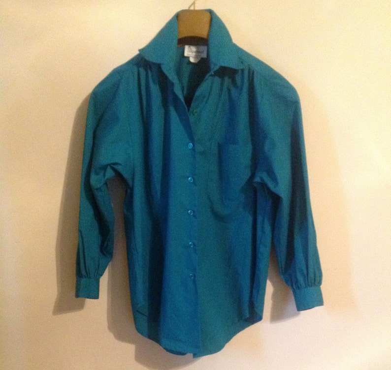 green shirt blouse